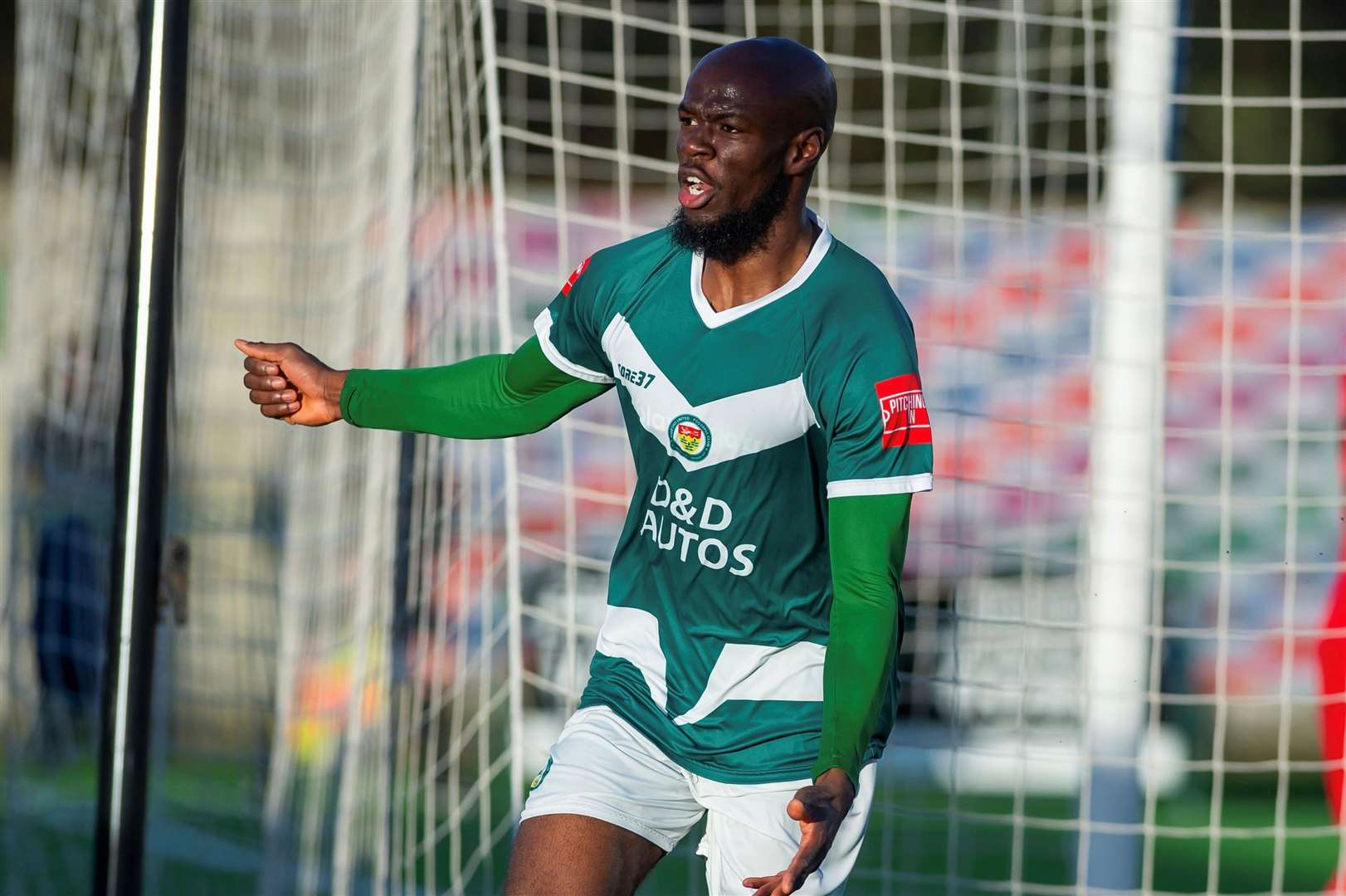 Ashford defender Tolulope Jonah celebrates after putting his side 2-1 up against Horndean. Picture: Ian Scammell