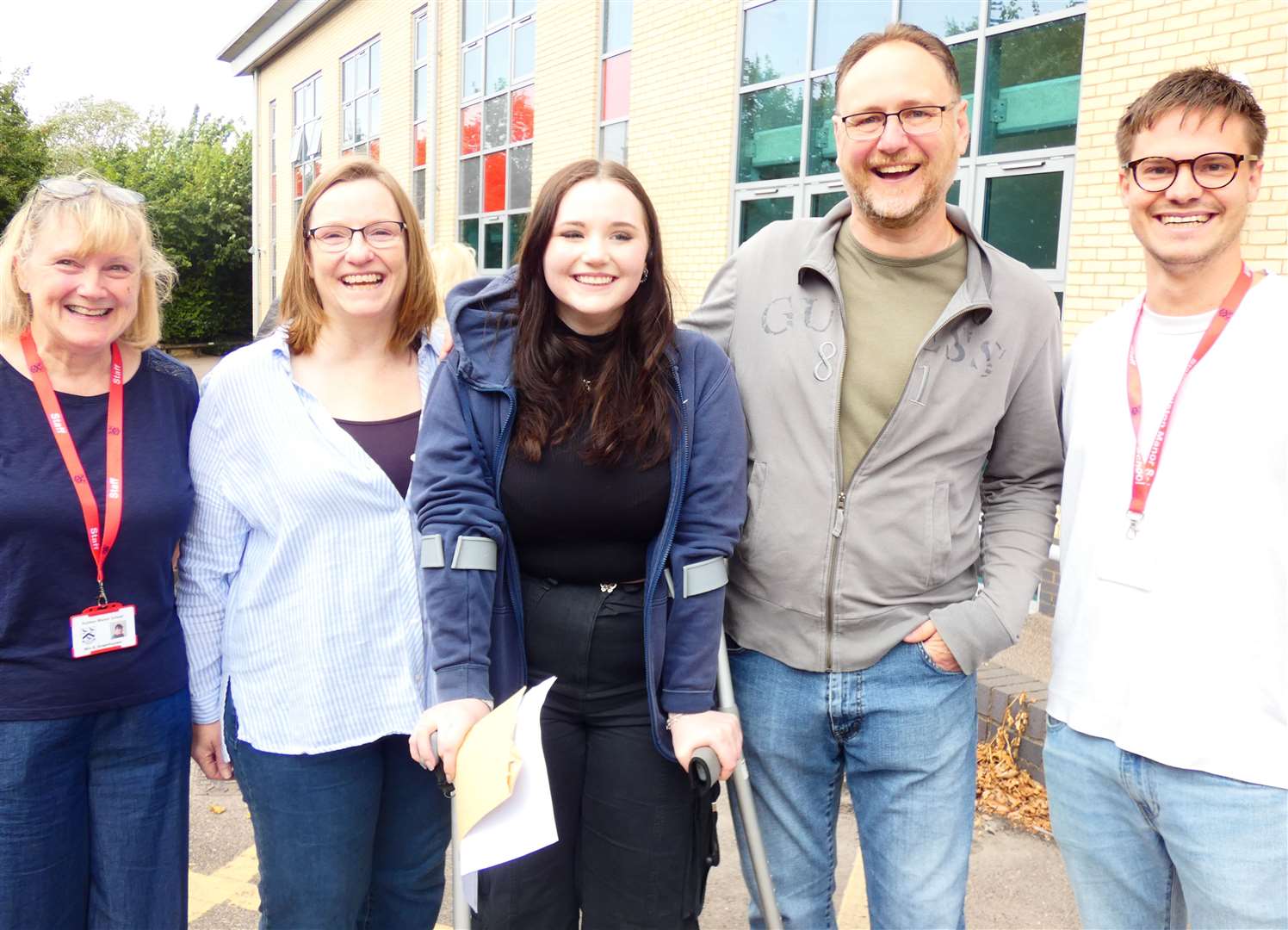 Beth celebrating her top results with her parents and staff at Fulston Manor in Sittingbourne