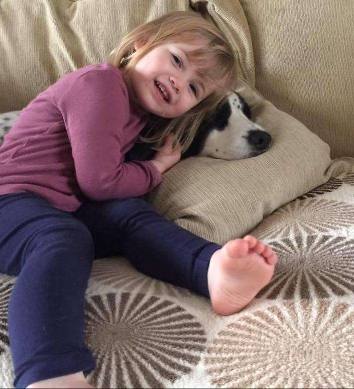 Tragic Faye Burdett who died from meningitis with Bob the dog. Photo: Charlene Reed