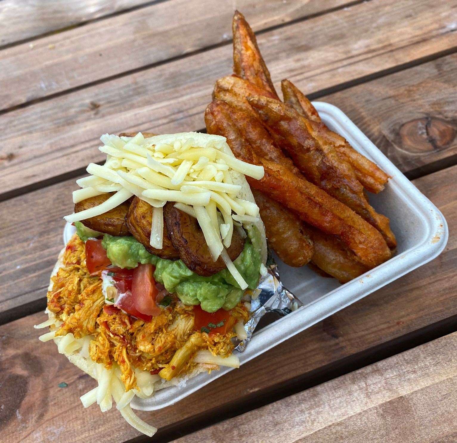 The delicious chicken arepa and tempura sweet potato fries