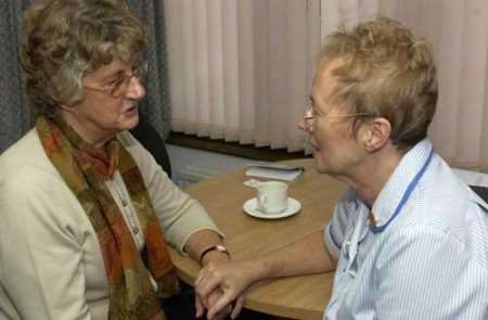 Connie Davies with nursing assistant Shirley Morse at the Heart of Kent Hospice. Picture: JOHN WARDLEY