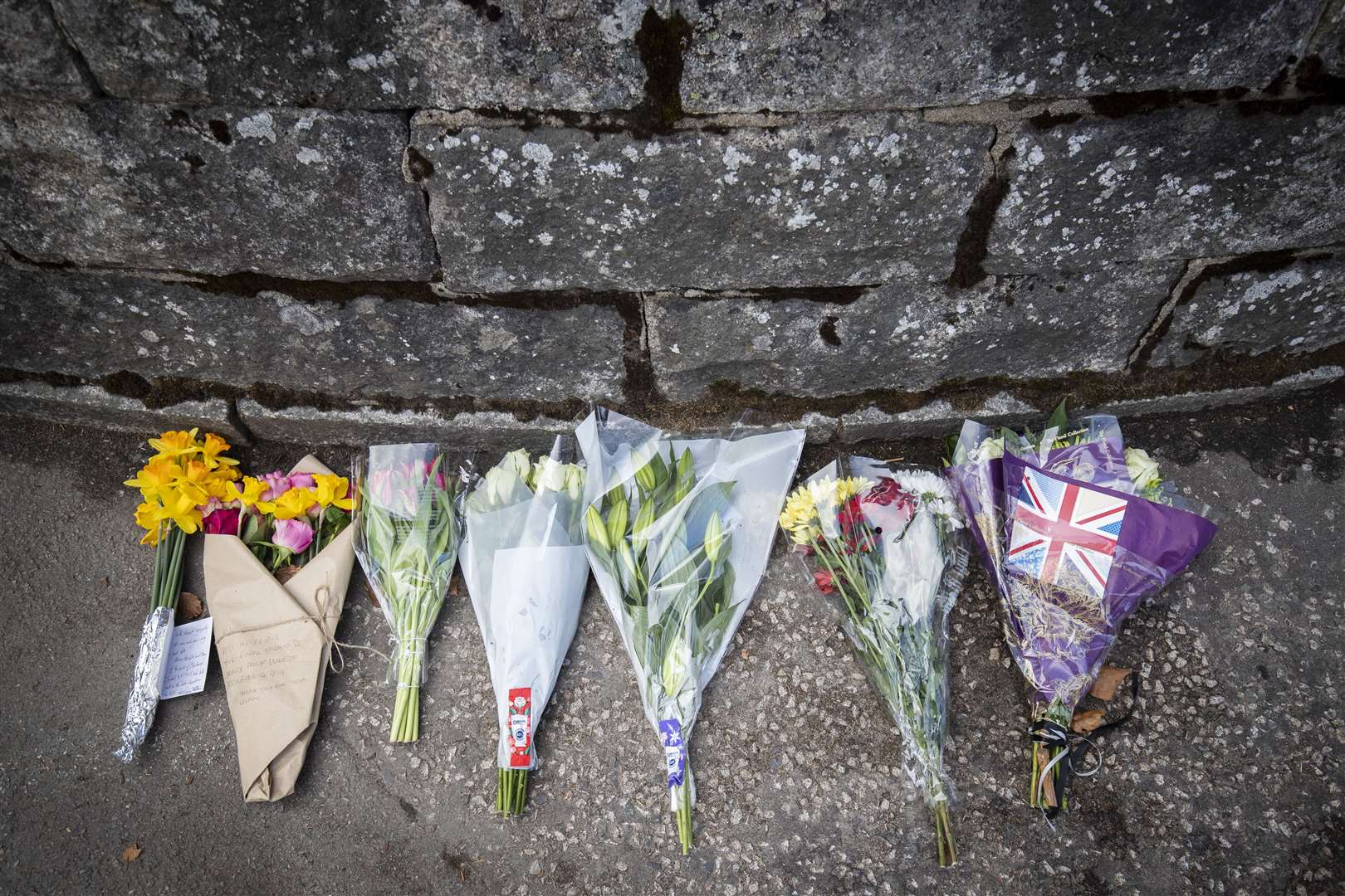 Flowers at the gates of Balmoral Castle (Jane Barlow/PA)