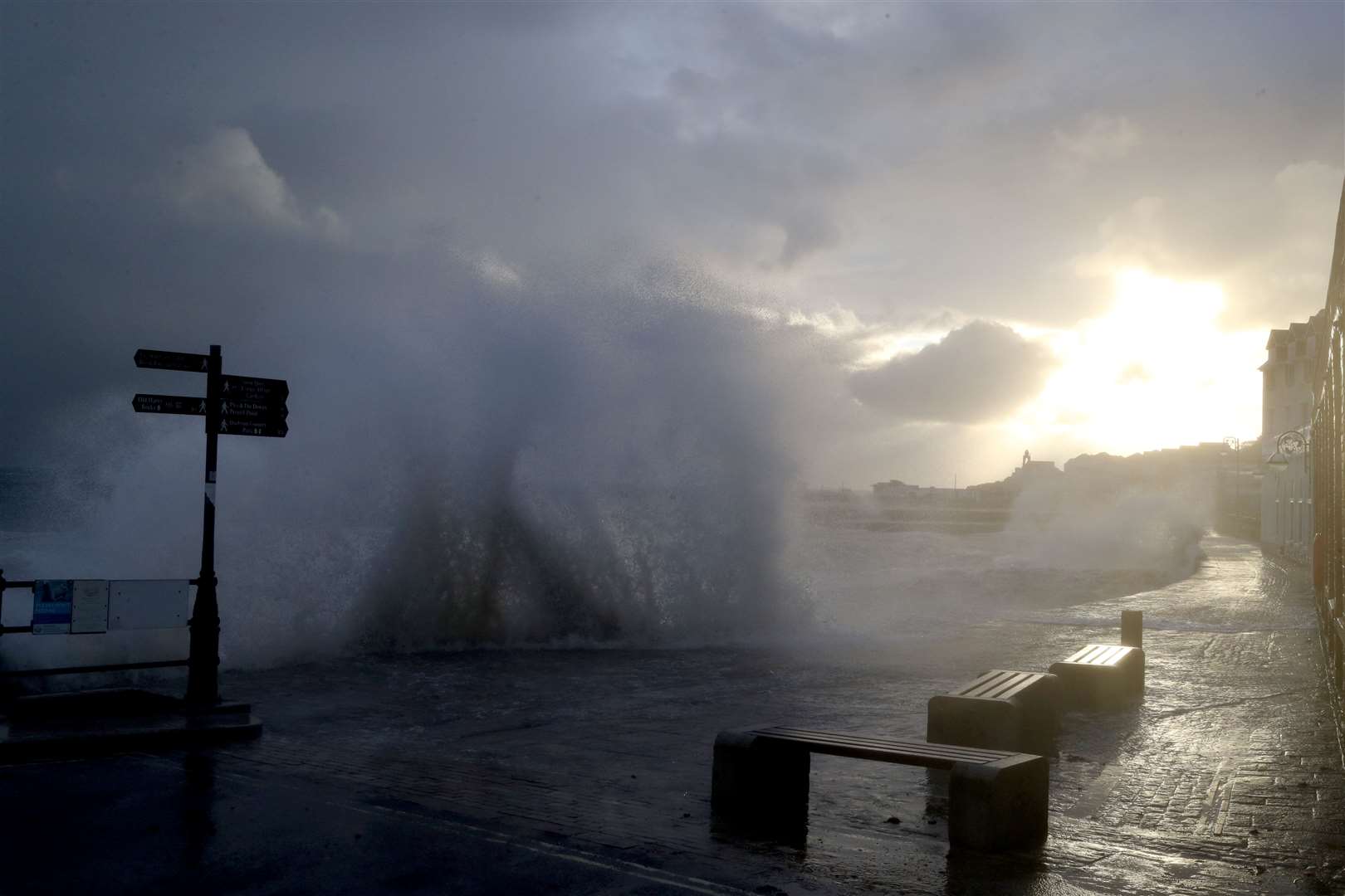 The sun rises behind the clouds at Swanage (Steve Parsons/PA)