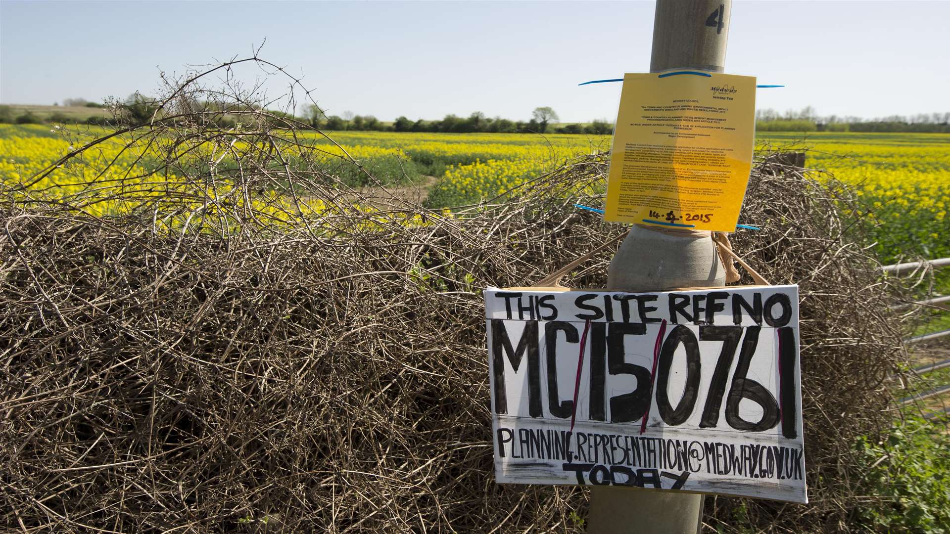 Signs encourage people to register their objections to one of the applicatons