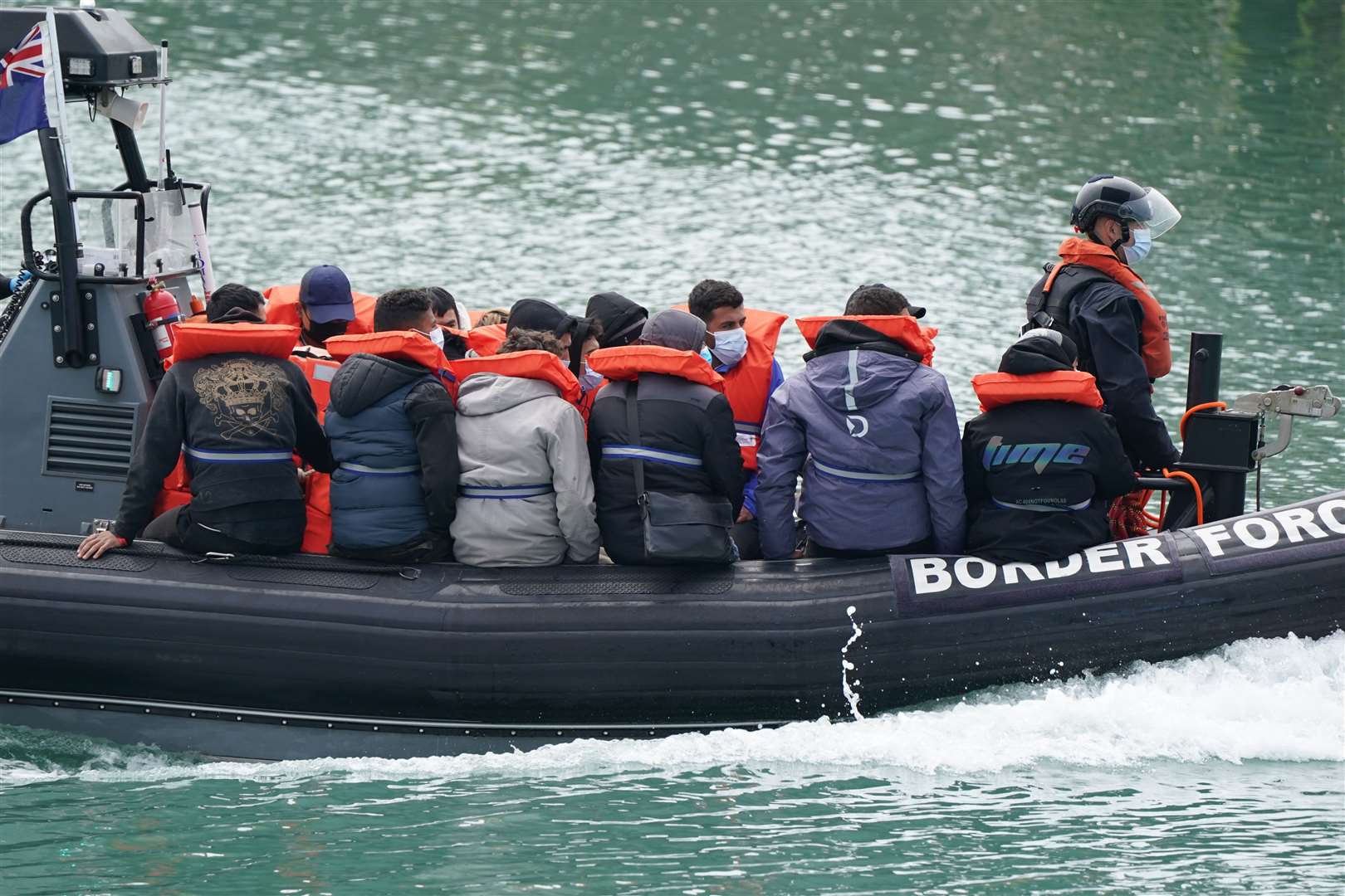 A group of people thought to be migrants are brought in to Dover, Kent, following a small boat incident in the Channel (Andrew Matthews/PA)