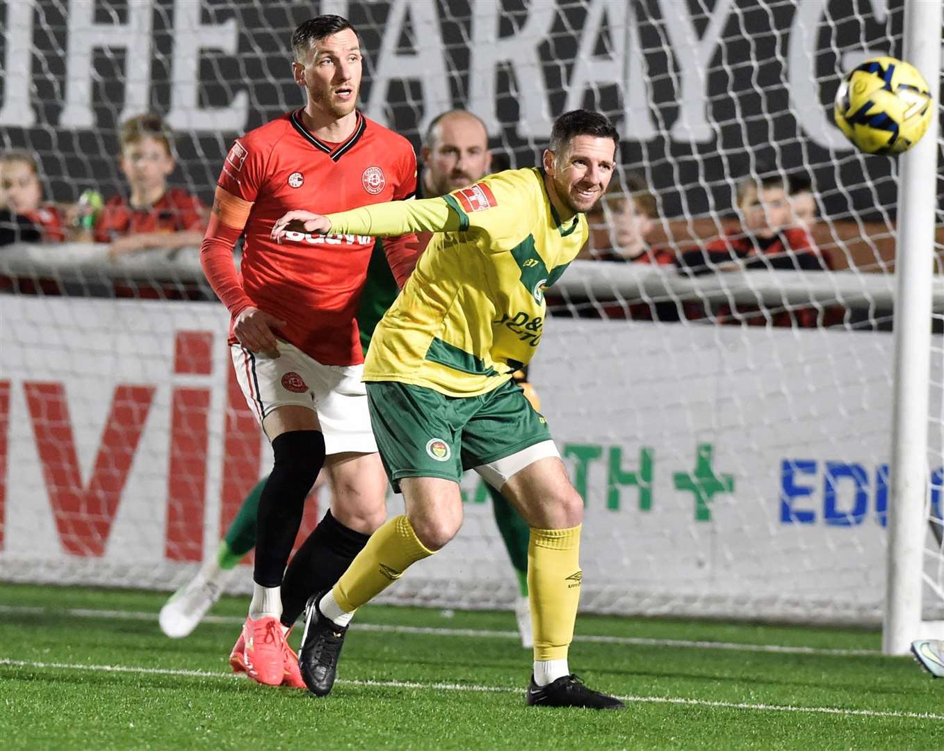 Ian Draycott is closed down by Chatham defender Simon Cooper during Ashford’s 4-2 League Cup semi-final defeat on Tuesday night. Picture: Ian Scammell