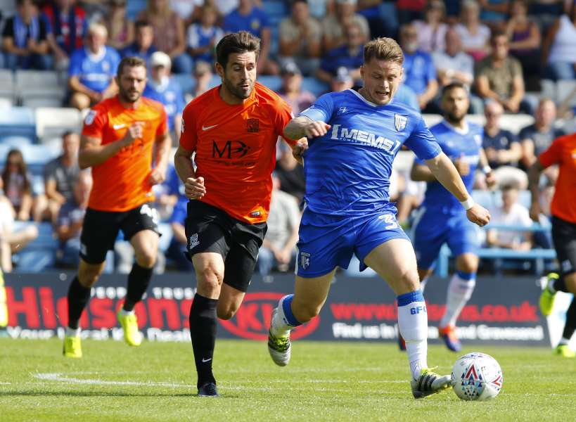 Mark Byrne charges forward for Gillingham Picture: Andy Jones