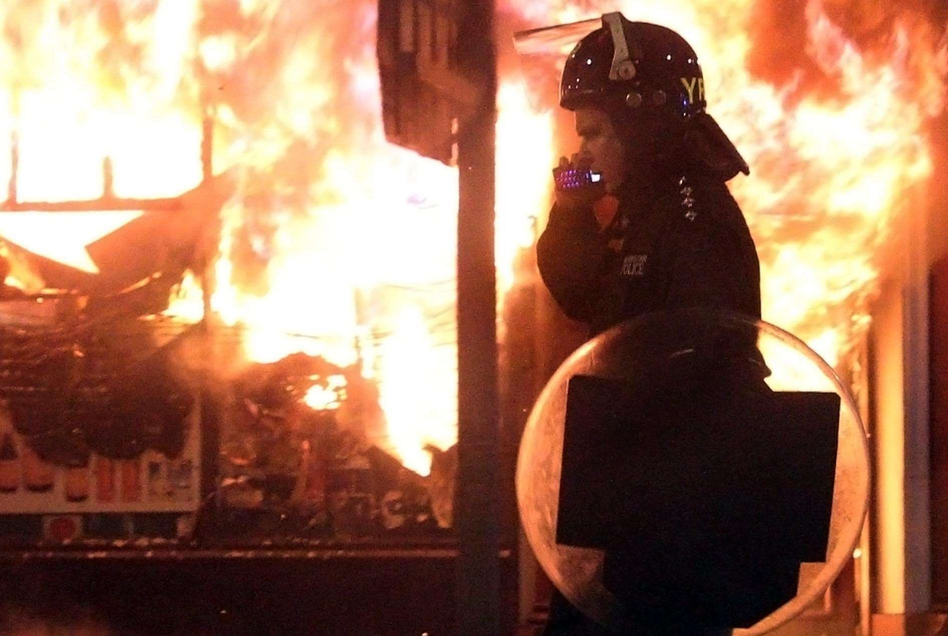 A police officer in Tottenham, north London, during riots in August 2011 (Lewis Whyld/PA)