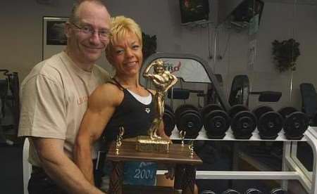 Carol Streeter with husband Carl and her trophy. Picture: JOHN WESTHROP