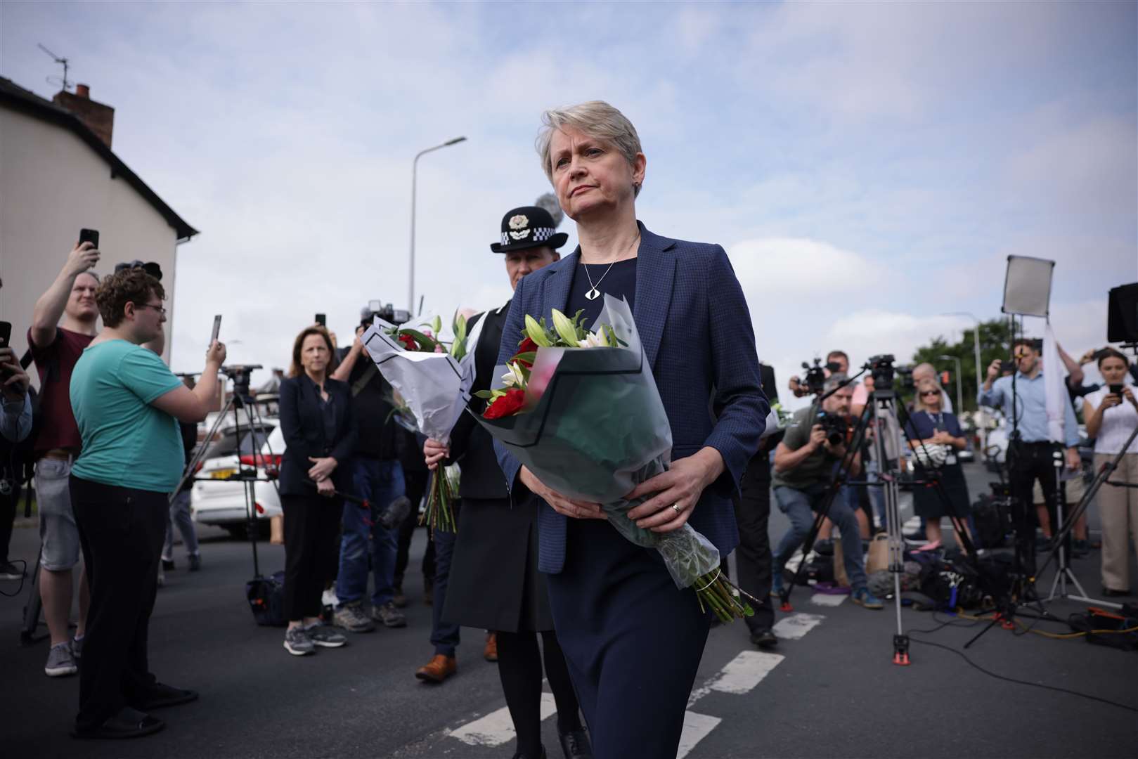 Home Secretary Yvette Cooper attended the scene in Hart Street, Southport, to lay flowers (James Speakman/PA)