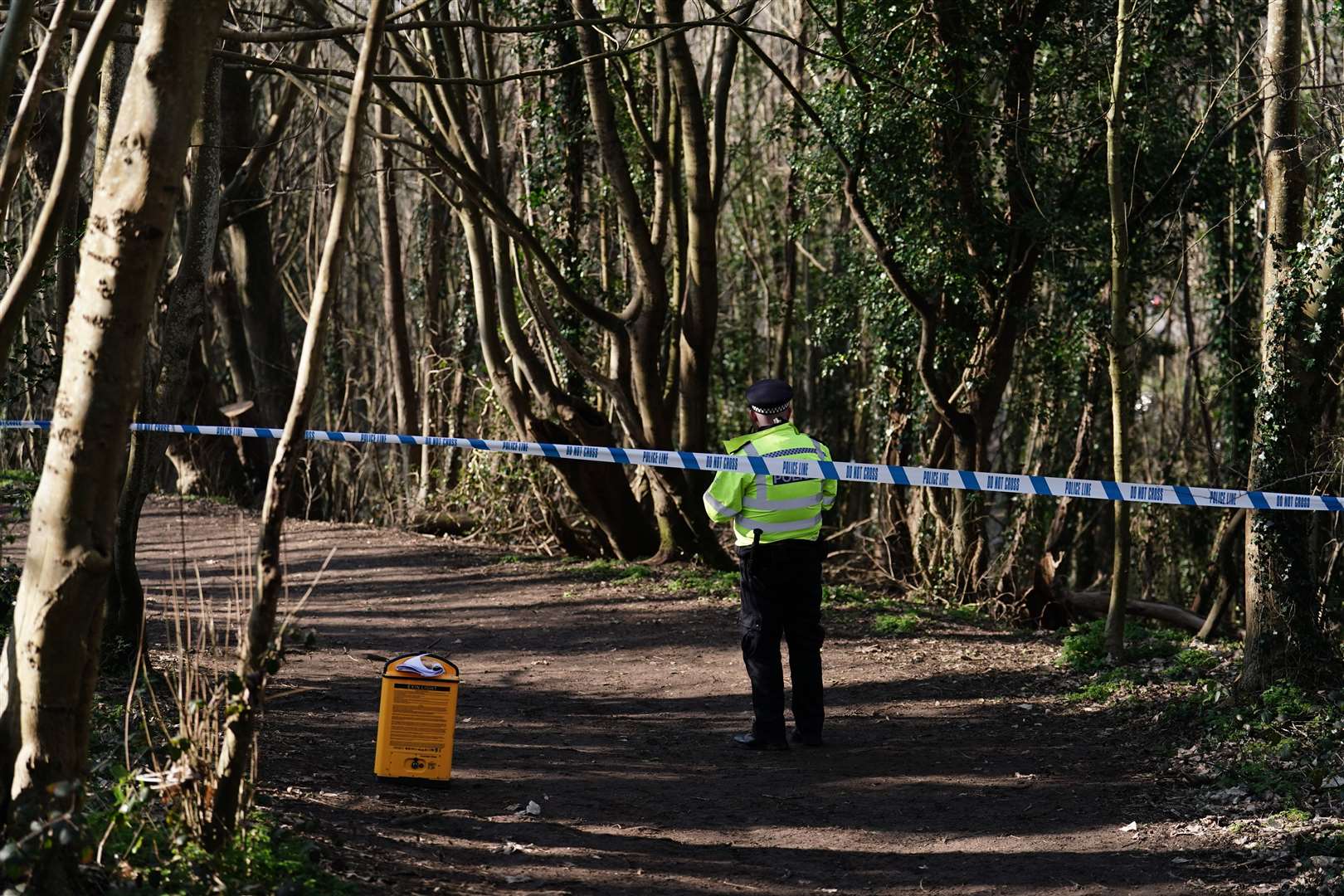 Police cordoned off an area of woodland in Brighton, East Sussex, near to where the remains were found (Jordan Pettitt/PA)