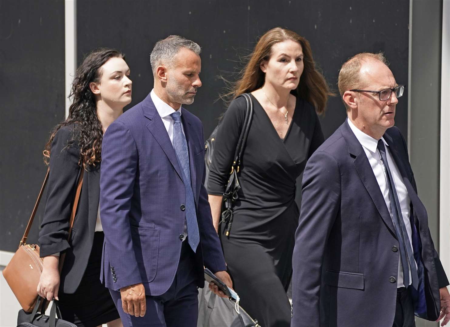 Ryan Giggs leaves Manchester Crown Court after pleading not guilty to assaulting two women and controlling or coercive behaviour (Peter Byrne/PA)