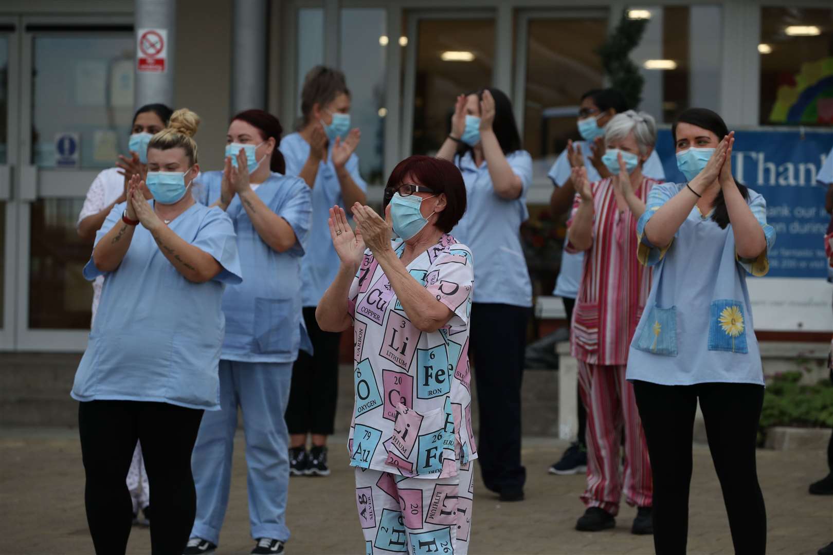 Staff outside Abbeydale Court Care Home in Hamilton clapping (Andrew Milligan/PA)