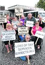 Campaigners outside the centre