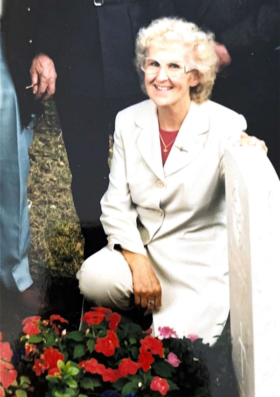 Jean Liddicoat beside the new gravestone for Flt Lt Freddie Rushmer