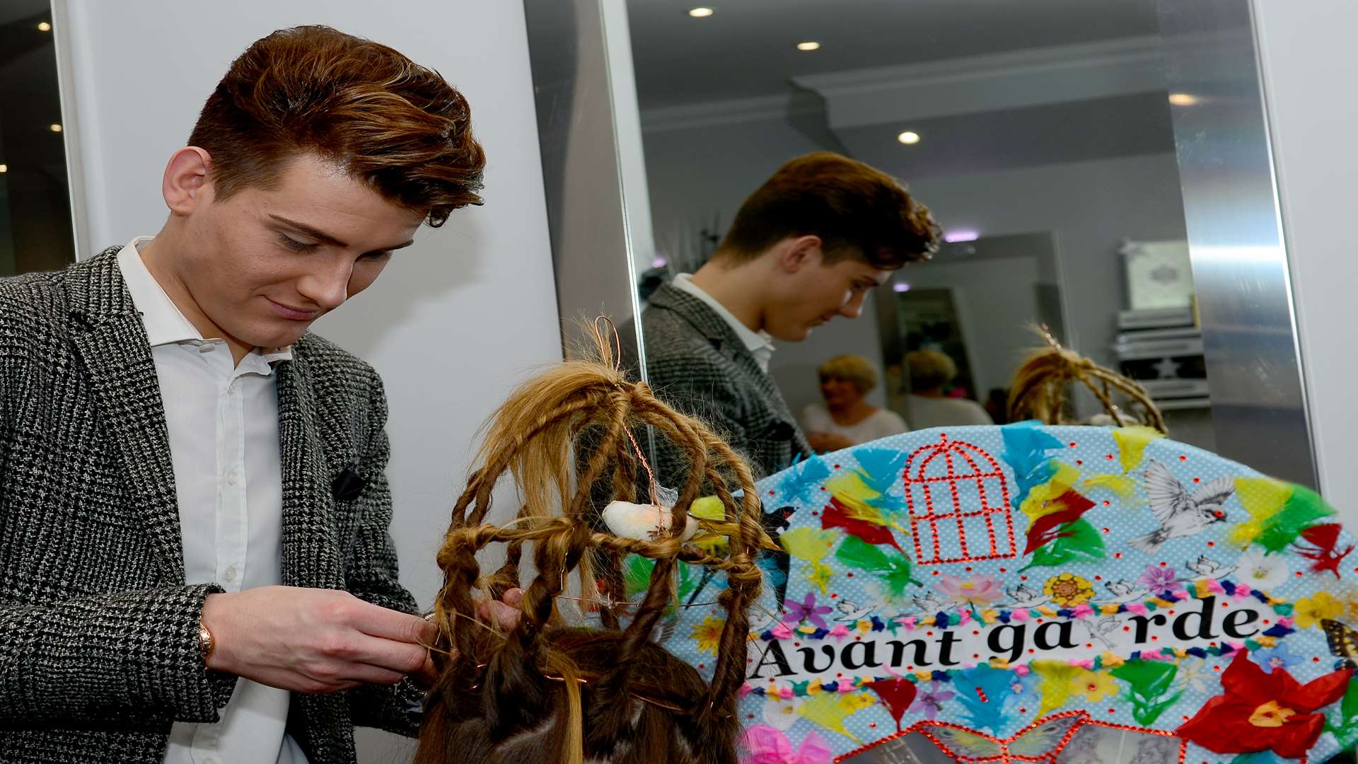 Stylist Thomas Drynan styled a birdcage out of hair during the Top Notch competition