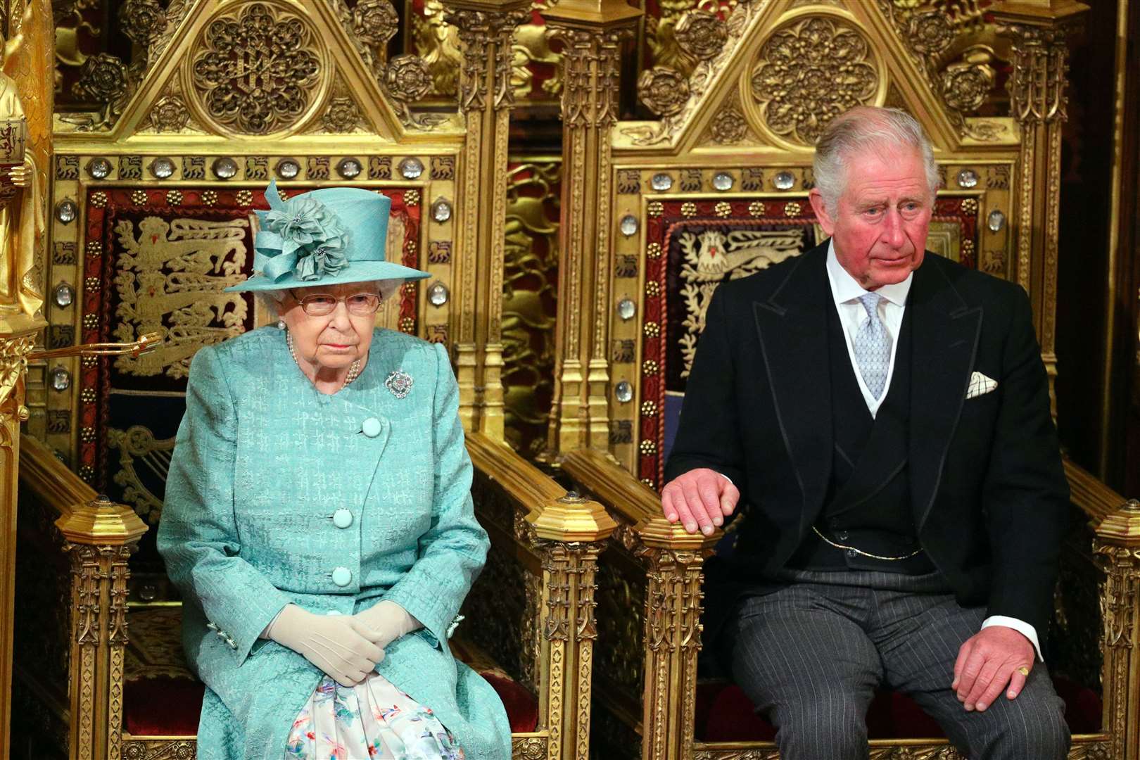 The Queen the Prince of Wales sit in the chamber ahead of the State Opening of Parliament in 2019 (Aaron Chown/PA)