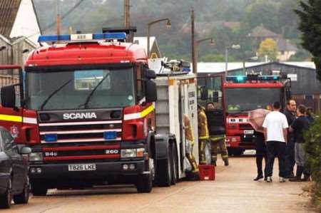 Firefighters at the scene of the fire in Hythe. Picture: BARRY GOODWIN