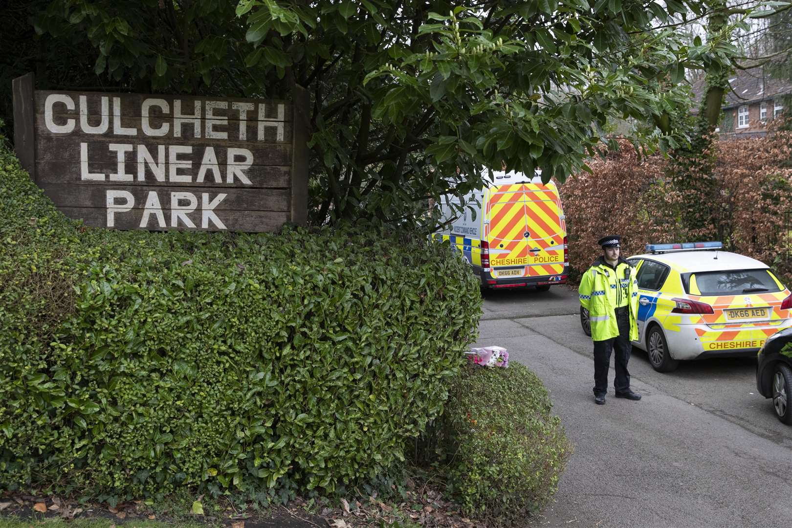 Police at the scene in Culcheth Linear Park (PA)