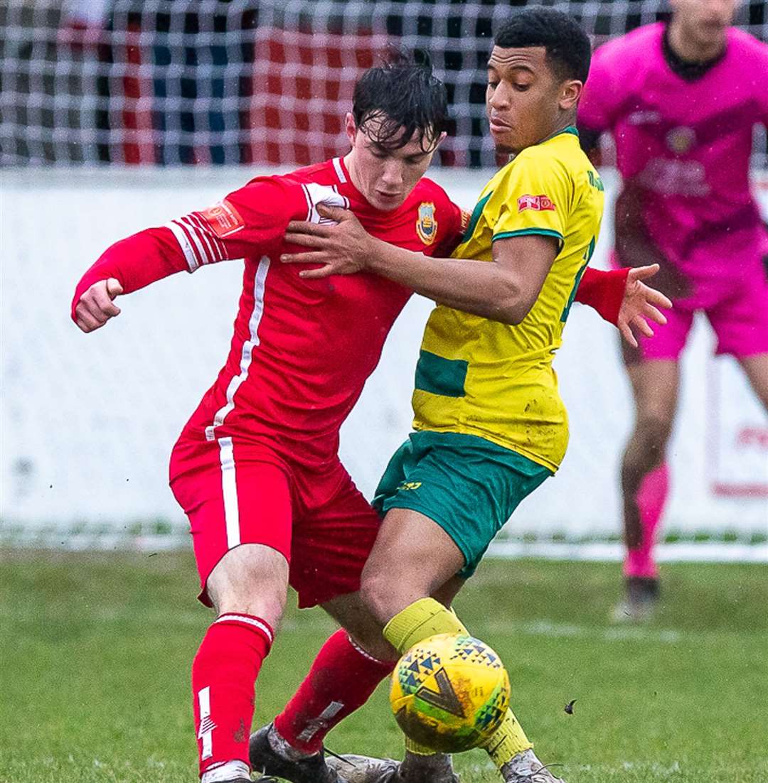 Whitstable's Gus Barnes in the thick of it. Picture: Les Biggs