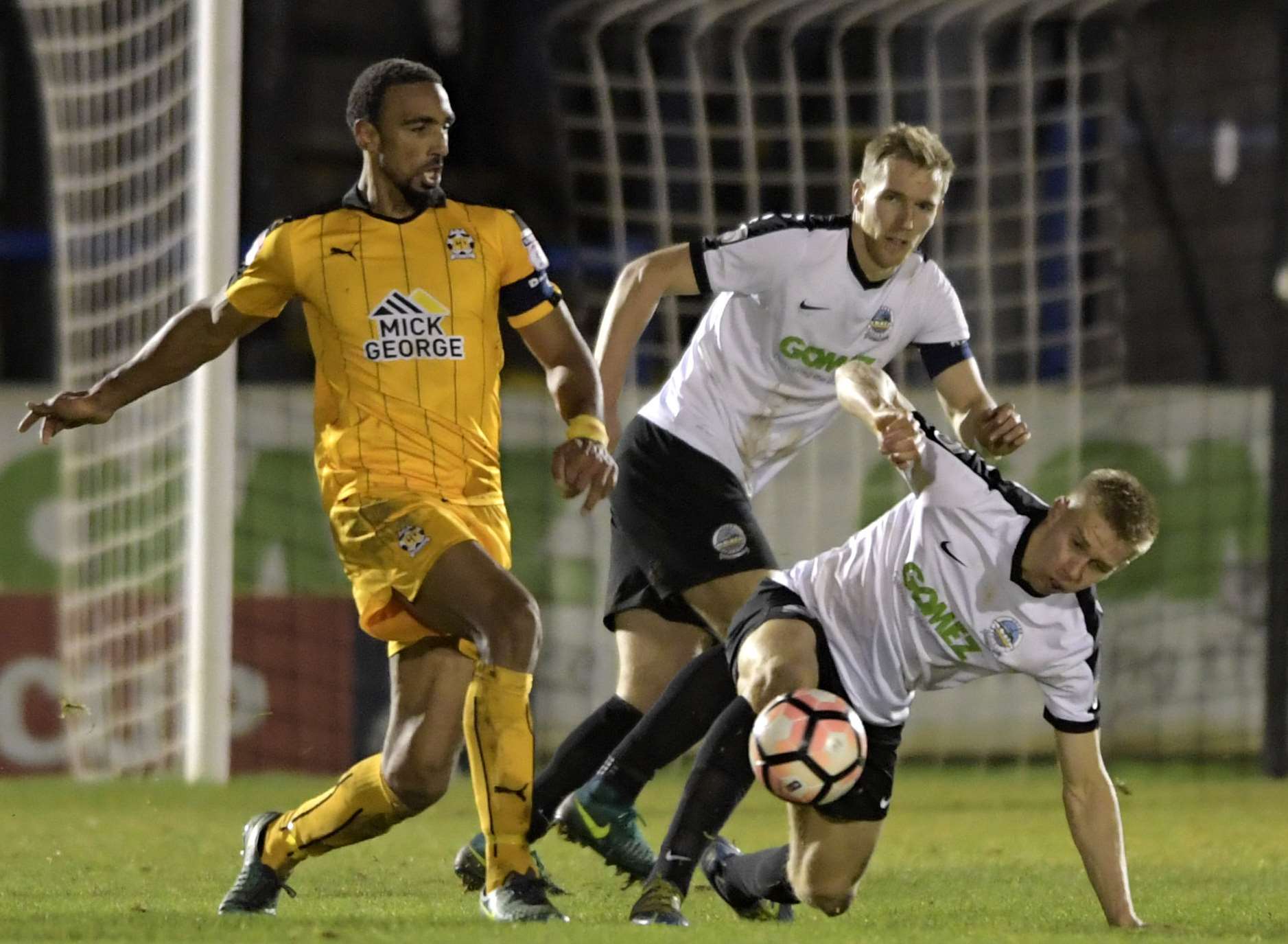 Dover close down former Gills defender Leon Legge, now captain of Cambridge. Picture: Barry Goodwin