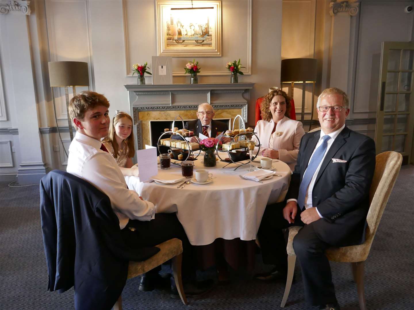 Sir Tom celebrating with his family (MGallery Hotel Collection)