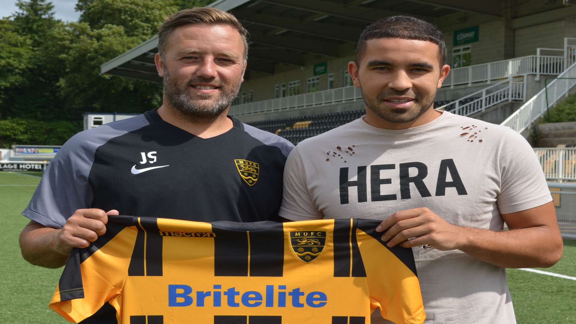 Maidstone boss Jay Saunders with new signing Jai Reason.