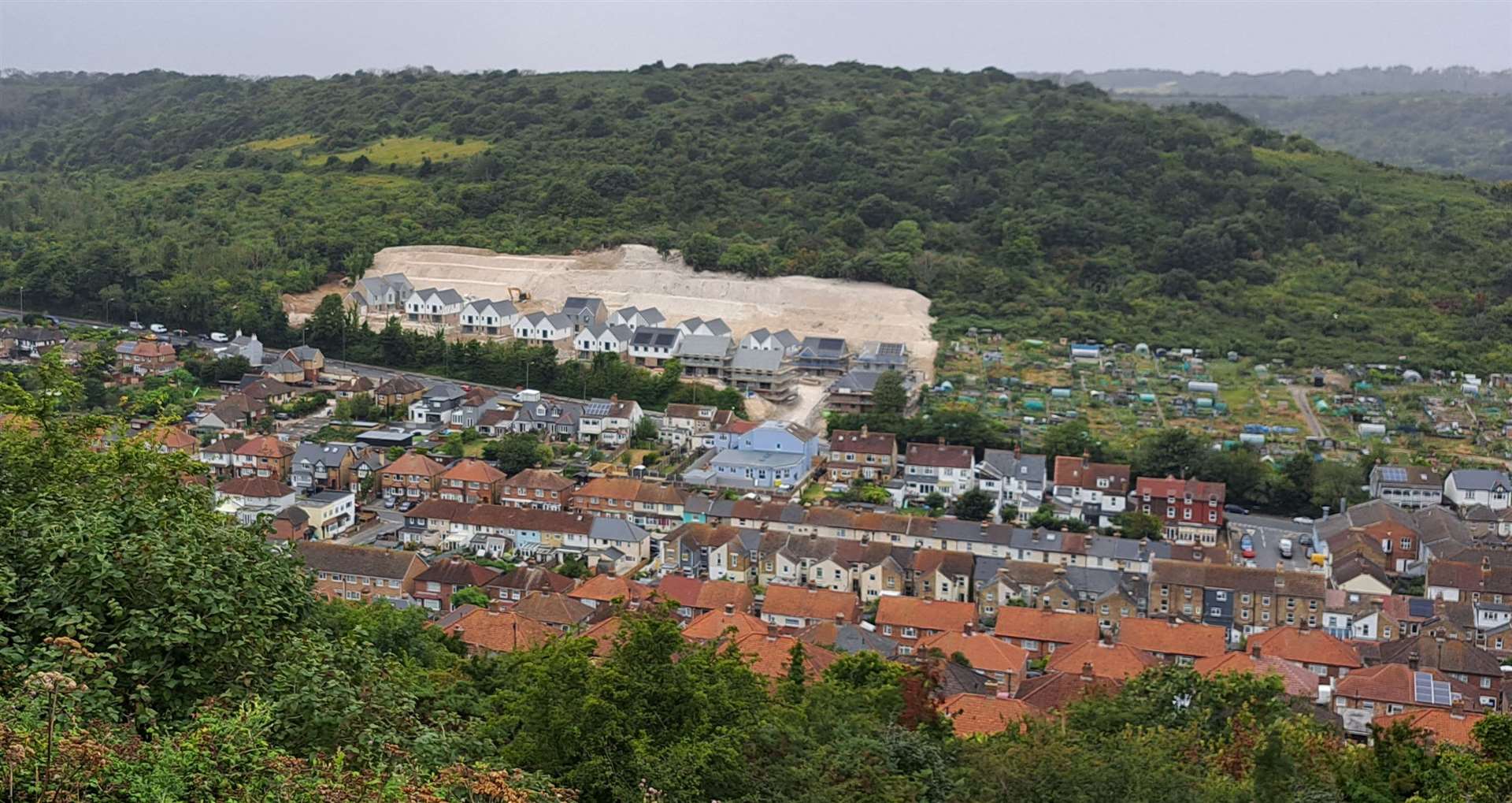 A wider perspective of the 'chalk scar'. The Maxton neighbourhood is seen immediately in front of it