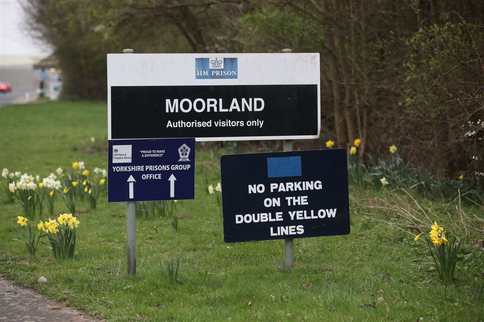 Signs outside HMP Moorland in Doncaster (Danny Lawson/PA)