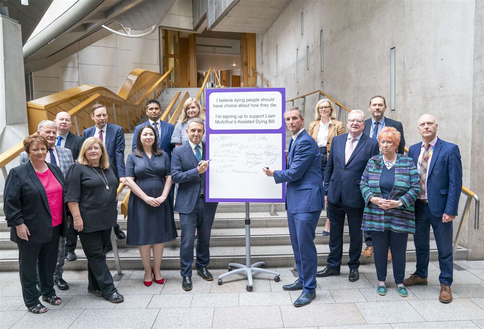 Liam McArthur (centre right) has been working to gain support from MSPs for his member’s Bill (Jane Barlow/PA)