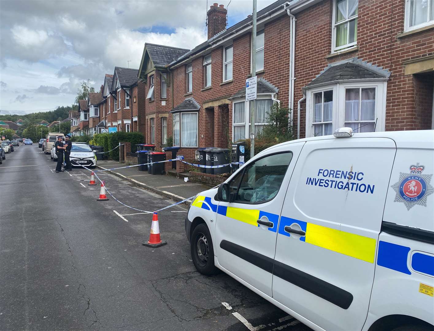 Police and forensics in St Martin's Road, Canterbury, on Friday