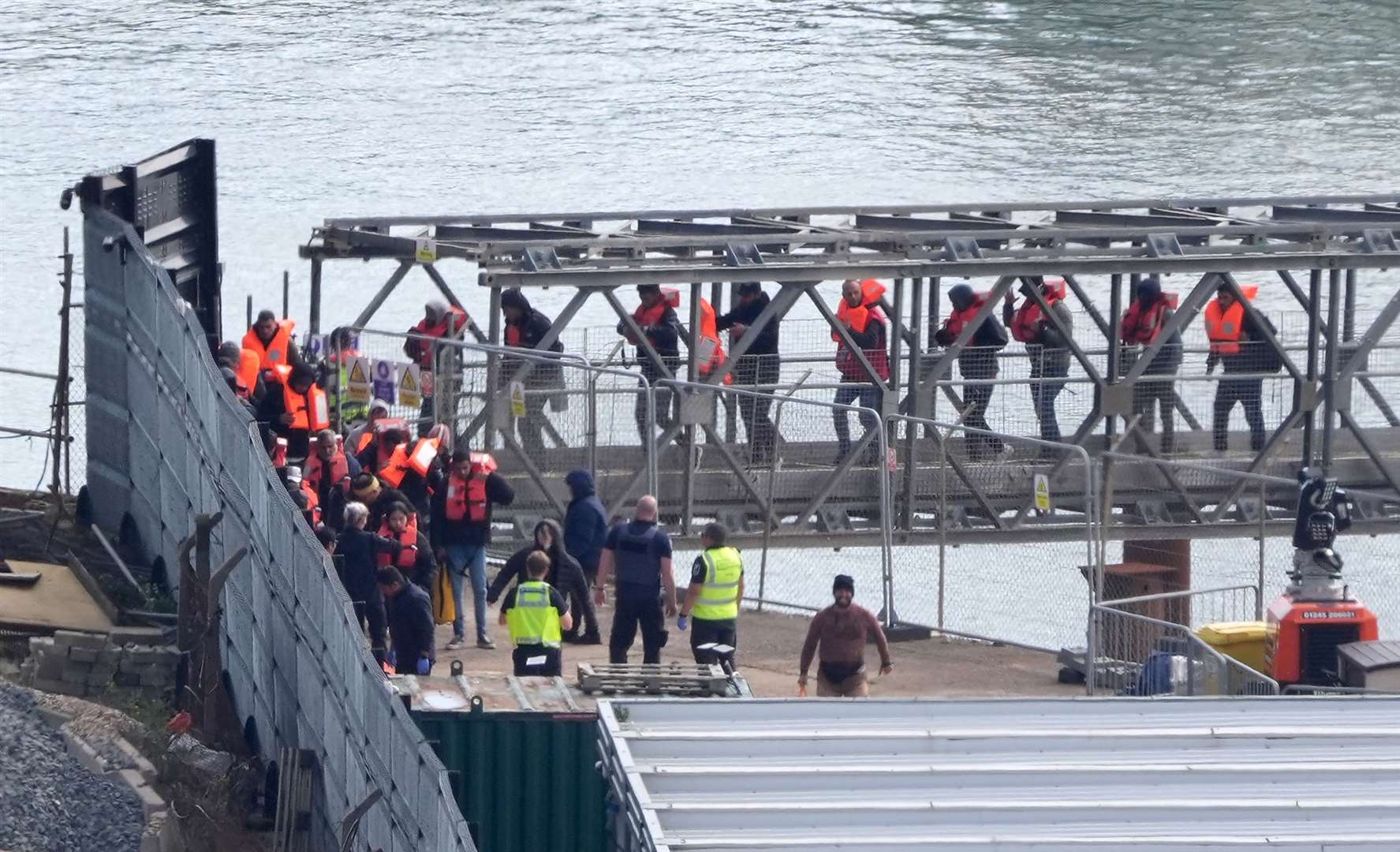 A group of people thought to be migrants are brought in to Dover from a Border Force vessel (Gareth Fuller/PA)