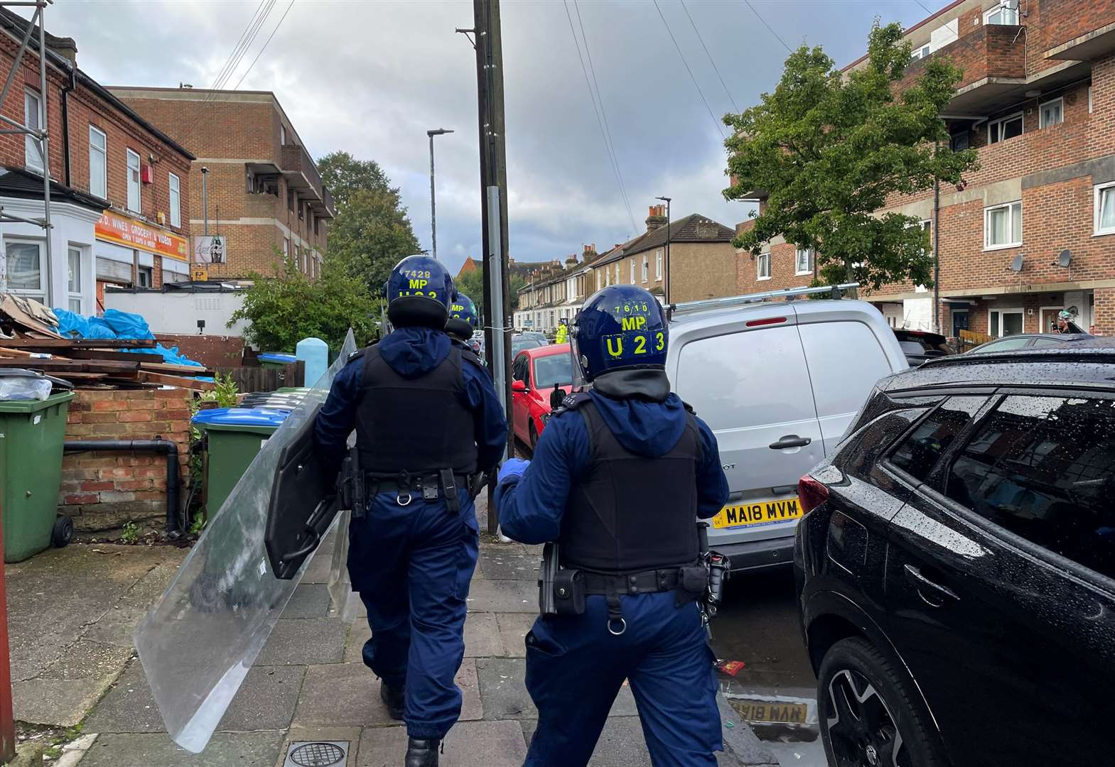 Metropolitan Police Territorial Support Group officers at the scene in Eglinton Road, Woolwich, south-east London (Rosie Shead/PA)