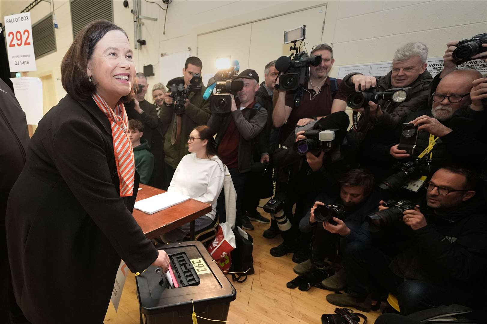 Ms McDonald faces a wall of photographers and reporters as she dropped her vote into the ballot box (Brian Lawless/PA)