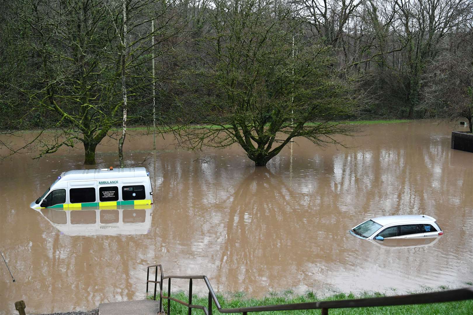 An ambulance was among the submerged vehicles in South Wales (Ben Birchall/PA)