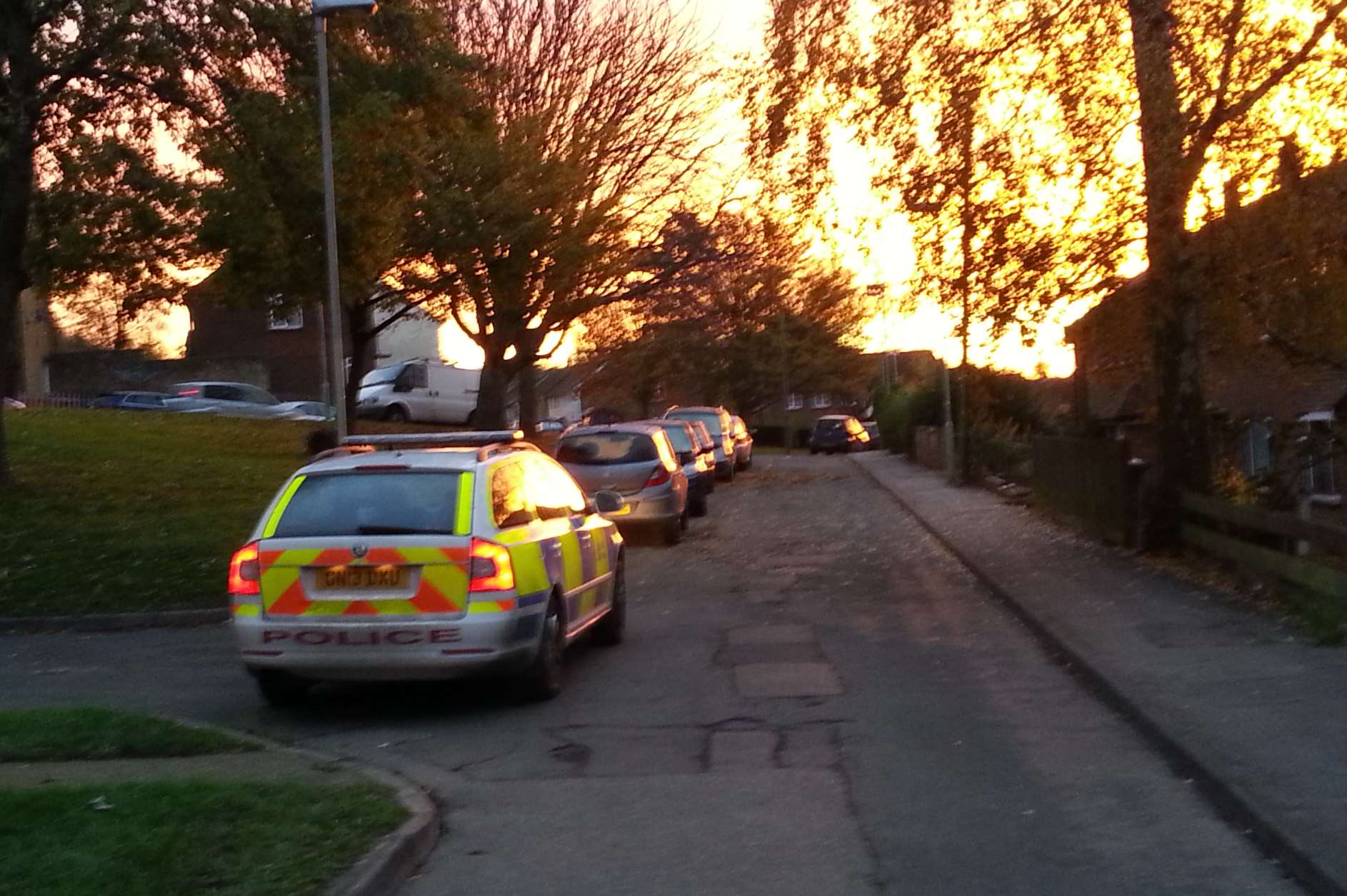 Police car at scene of stabbing in Kent Avenue