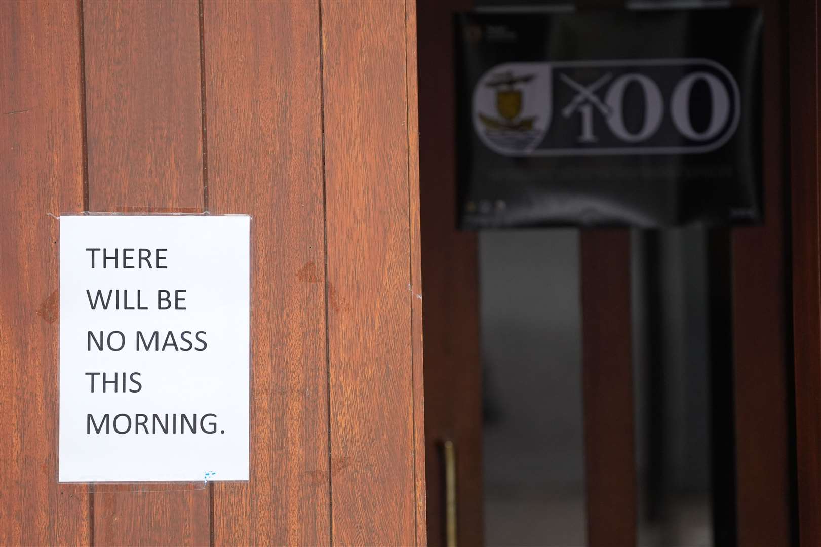 A sign on the door at St Patrick’s Garrison Church at Renmore Barracks on Friday (Brian Lawless/PA)