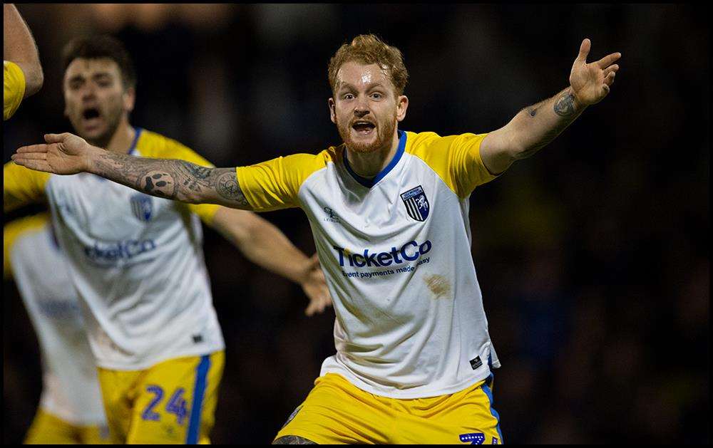 Connor Ogilvie appeals after Gillingham think they score Picture: Ady Kerry (6275021)