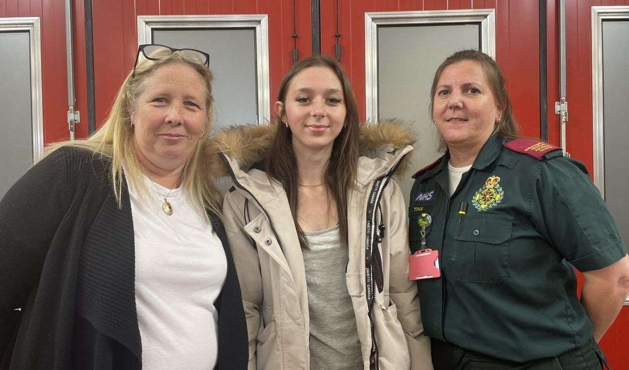 Grace with mum Clare are reunited with Tina Shepherd, emergency medical advisor, who was part of the team when Grace had a cardiac arrest