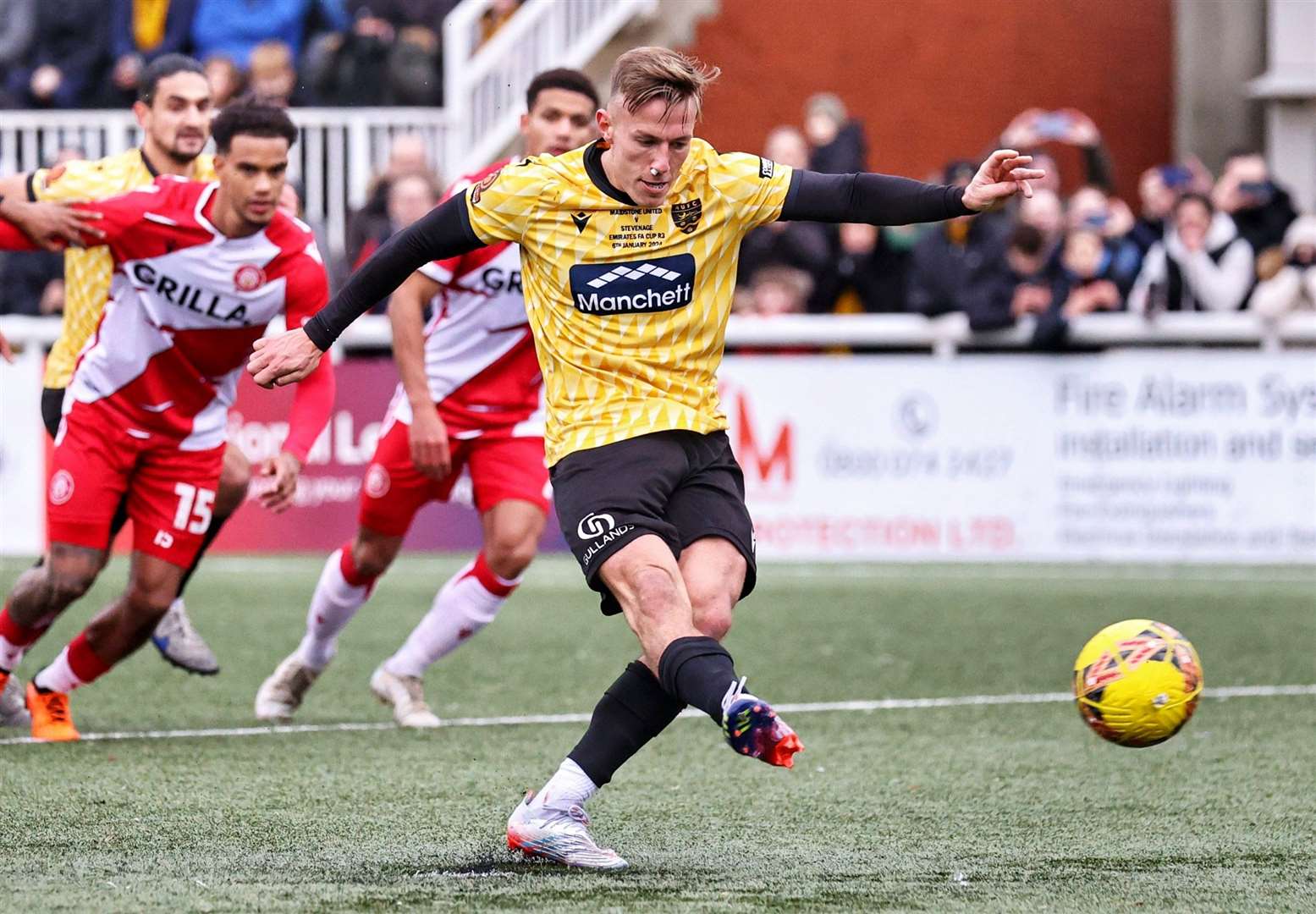 Sam Corne scores from the spot against Stevenage. Picture: Helen Cooper