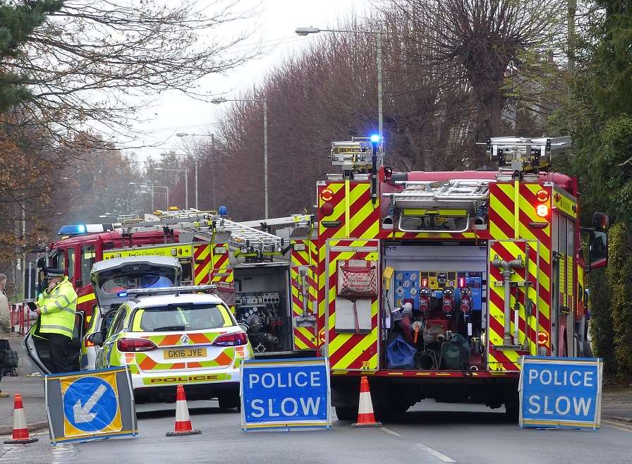 Firefighters and police at the scene. Pic by Andy Clark