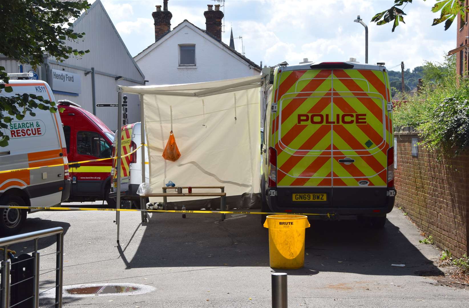 Police were also in the nearby flats in Holdforth Street