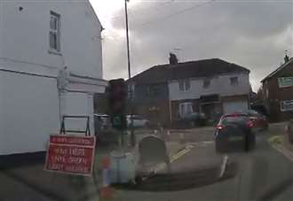 Three-way traffic lights installed on busy road