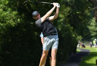 Wood impresses on home course
