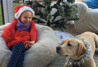 Puppy love as Lab brings joy to girl who can't see or talk
