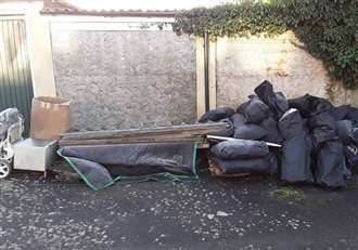 Bags of asbestos dumped near homes