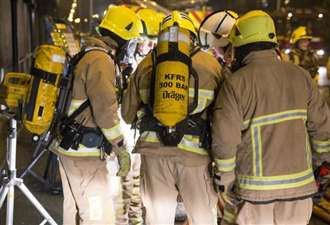 Man in hospital after being rescued from smoke-filled flat
