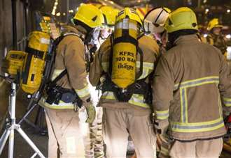 Man in hospital after flat fire