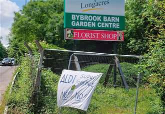 Signs posted as residents hit out at Aldi plans