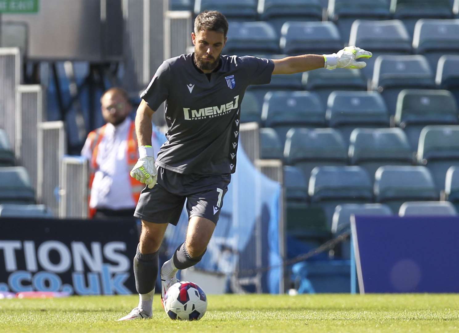 Gillingham goalkeeper Glenn Morris clears on his way to a clean sheet. Picture: KPI